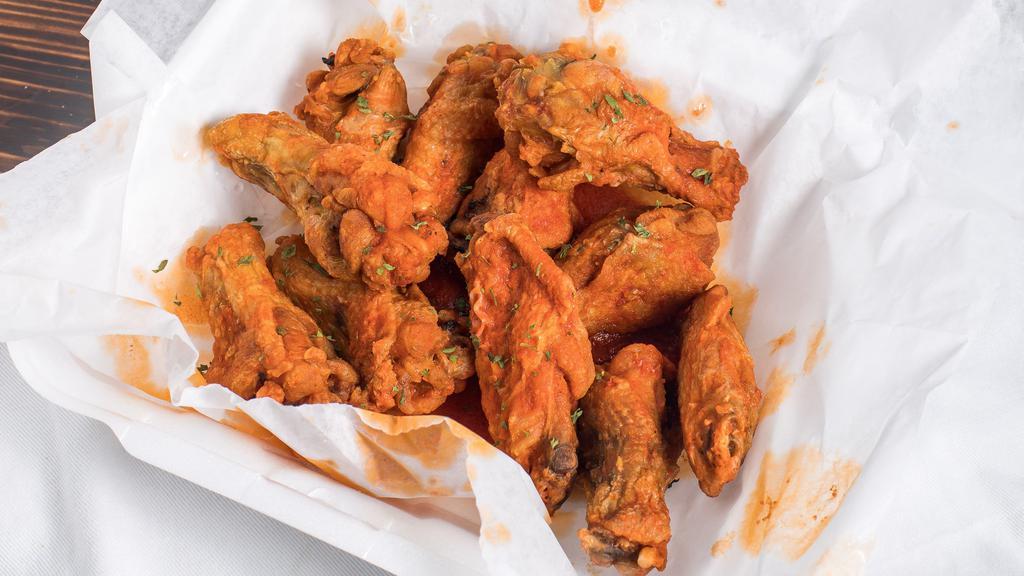 Buffalo Wings (50 Pieces) · Up to four flavors.