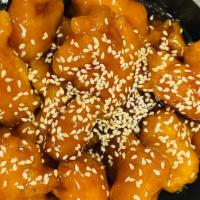 Sesame Chicken · Tender crispy chicken sautéed in the Chef's special sauce with sesame.