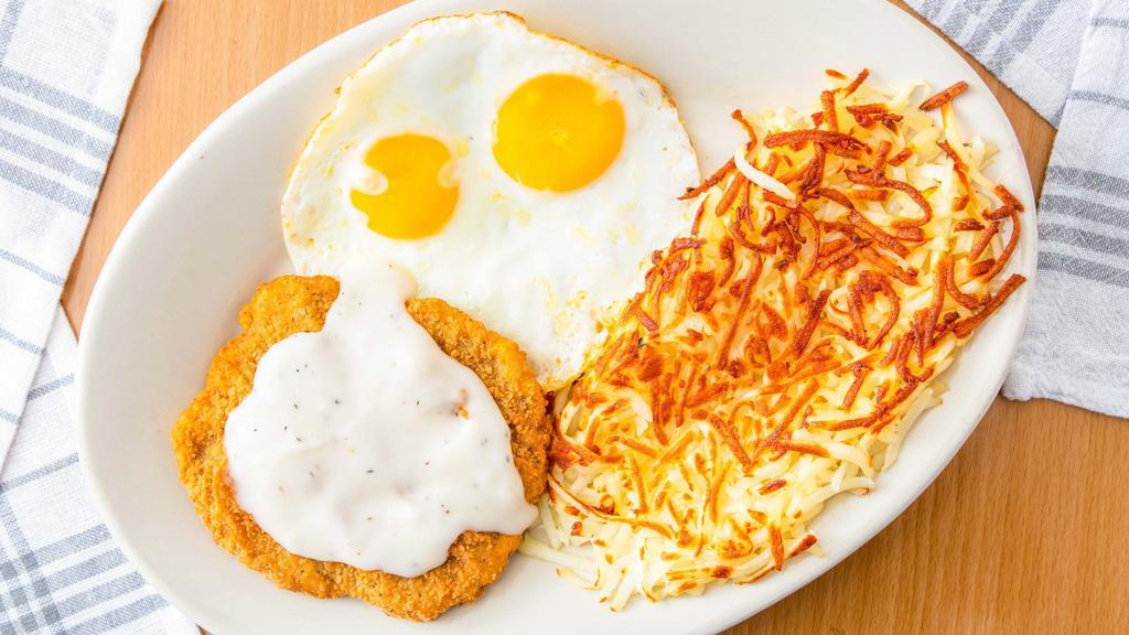 Chicken Fried Steak & Eggs · Chicken fried steak with two eggs any style, hash browns and biscuits with gravy.