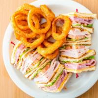 Ultimate Club · Ham, turkey, bacon, and cheese on choice of bread. Chips or French fries.