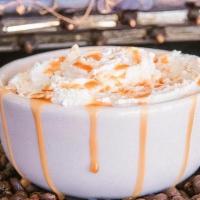 Spiced Apple Cider · Hot cider with caramel sauce, topped with whipped cream and cinnamon powder