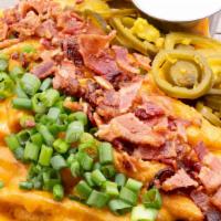 Kenny'S Loaded Cheese Fries · Cheddar, jalapeños, bacon, chives, ranch.
