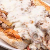 Kenny'S Steak Bomb · Hoagie, shaved ribeye' mushrooms, onions, peppers, white American, provolone.