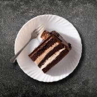 Classic Choco Cake · Classics never go out of style! This luscious, soft, moist Chocolate Cake is coated with a g...