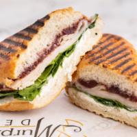 Cranberry Turkey · Smoked turkey breast, baby spinach, cream cheese, and cranberry sauce.