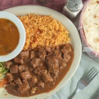 Carne Guisada Plate · Tender beef with special gravy sauce.