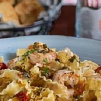 Shrimp Scampi · Jumbo gulf shrimp sauteed with pinot grigio lemon and garlic sauce, capers, and sun-dried to...