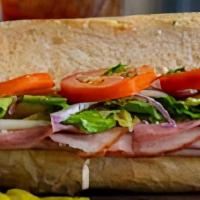 Italian Deli Sandwich · Prosciutto, soppressata di salami, mortadella ham, provolone cheese, romaine lettuce, red on...
