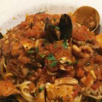 Frutti Di Mare · shrimp, calamari, white fish, lobster brodo sauce with linguine pasta