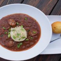 Red Beans + Rice Bowl · Spicy red beans + white rice, andouille sausage slices, cornbread muffin