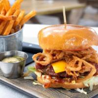 Bbq Bacon Cheeseburger · Angus burger, american cheese, spicy BBQ sauce, frazzled onions, bacon, lettuce, tomato, art...