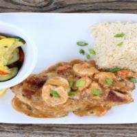 Snapper Pontchartrain · Breadcrumb seared snapper, topped with Louisiana crawfish tails, shrimp + crabmeat