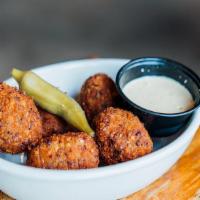Boudin Balls · House-made boudin served with remoulade.