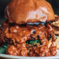 Crawfish Fondue Burger · Spinach and Cheddar cheese with white wine and crawfish cream sauce.