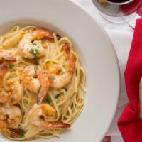 Shrimp Scampi · Broiled shrimp sautéed in a heavy garlic white wine sauce.