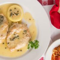 Chicken Picata With Capers · Chicken breast sautéed in a lemon butter garlic sauce with capers.