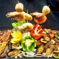 Super Usa Parrillada · Fish, Octopus, Shrimp, Scalps, Mussels, Pork Sausage Beef, and Chicken.