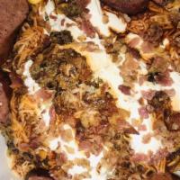 Baked Potato With 2 Meats · Includes cheese, sour cream, bacon bits, butter and chives.