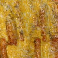 #7 Paul'S Enchiladas · Beef, chicken, or cheese. Topped with Chile con carne. Served with rice and beans.
