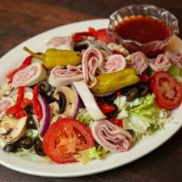 Brothers Salad · Cool crisp iceberg and romaine lettuce topped with fresh mozzarella, red onions, ripe black ...
