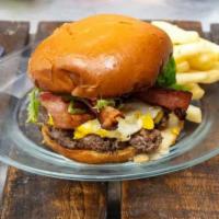 Breaker Burger · Fresh ground beef, arugula, applewood smoked bacon, sunny side up fried egg, chipotle Chedda...
