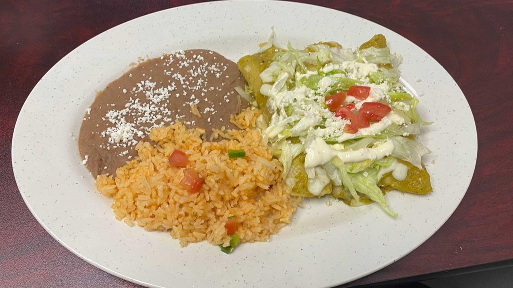 Enchiladas Verdes · 3 Enchiladas with Green Sauce, Red Sauce or Mole
Stuffed with chicken, Beef or cheese, served with Rice and Beans.