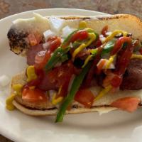 Mexican Hot Dog · With mustard, Mayo, Bacon, Onions, Ketchup, Tomato & Jalapeño Pepper