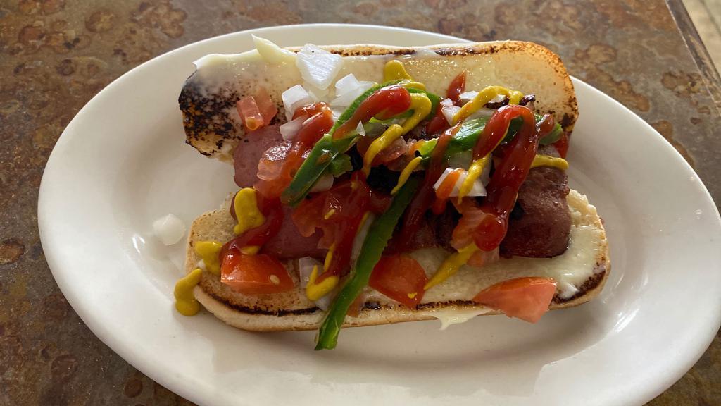 Mexican Hot Dog · With mustard, Mayo, Bacon, Onions, Ketchup, Tomato & Jalapeño Pepper