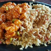 Sesame Chicken · Sesame seeds, scallions and a sweet tangy sauce.