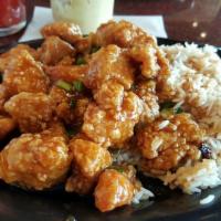 Orange Blossom Chicken · Orange zest, chili and a sweet tangy sauce.