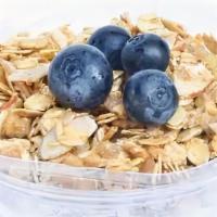 Blueberry Yogurt Parfait · Greek yogurt parfait with fresh blueberries and honey granola.