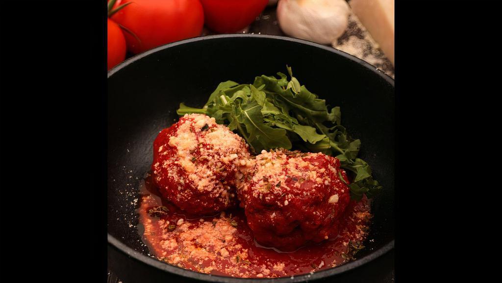 Meatballs Appetizer · Homemade grass-fed beef meatballs blended with fine herbs, cooked in our marinara sauce with parmesan and bread.