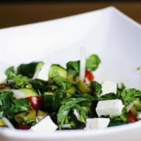 Insalata Di Spinaci · Fresh spinach with cannellini beans, roasted tomatoes, red onions and feta cheese in a balsa...