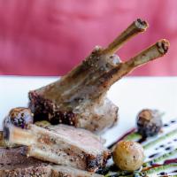 Costolette Di Agnello · Pan-seared New Zealand lamb chops marinated in a spicy balsamic sauce, accompanied with cara...