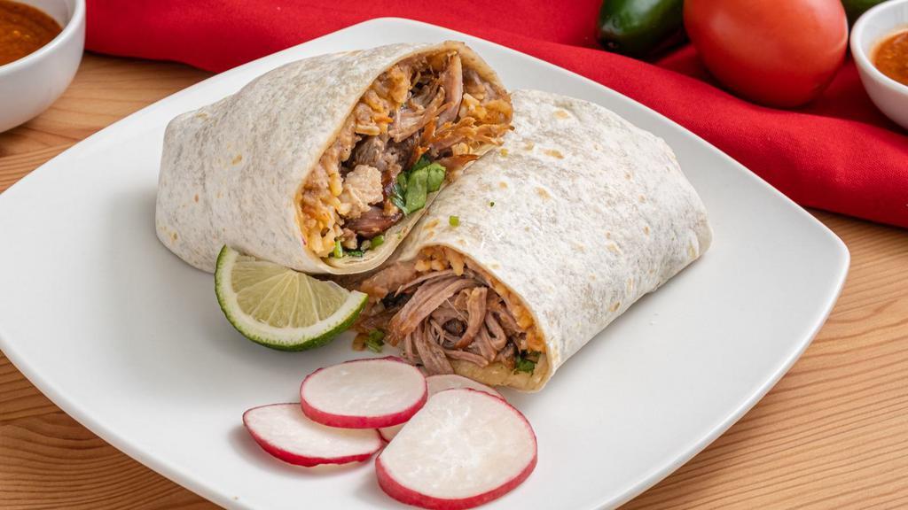 Grande Carnitas Burrito · A giant tortilla stuffed with braised pork, rice, beans, sour cream, guacamole, lettuce, jack cheese and your choice of salsa.