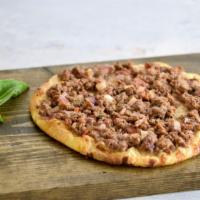 Meat Bread · Ground beef with onions, tomatoes and house spices