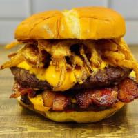 Charly'S Burger · Two patties, American cheese, bacon, crispy onions, house-made spicy ketchup