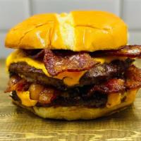 Bacon Cheese Burger · Two patties, American cheese,  bacon, spicy ketchup