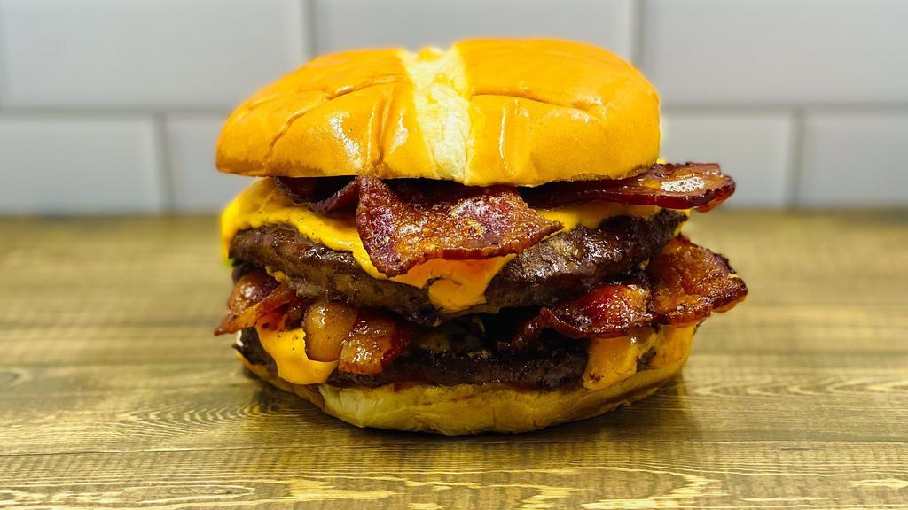 Bacon Cheese Burger · Two patties, American cheese,  bacon, spicy ketchup