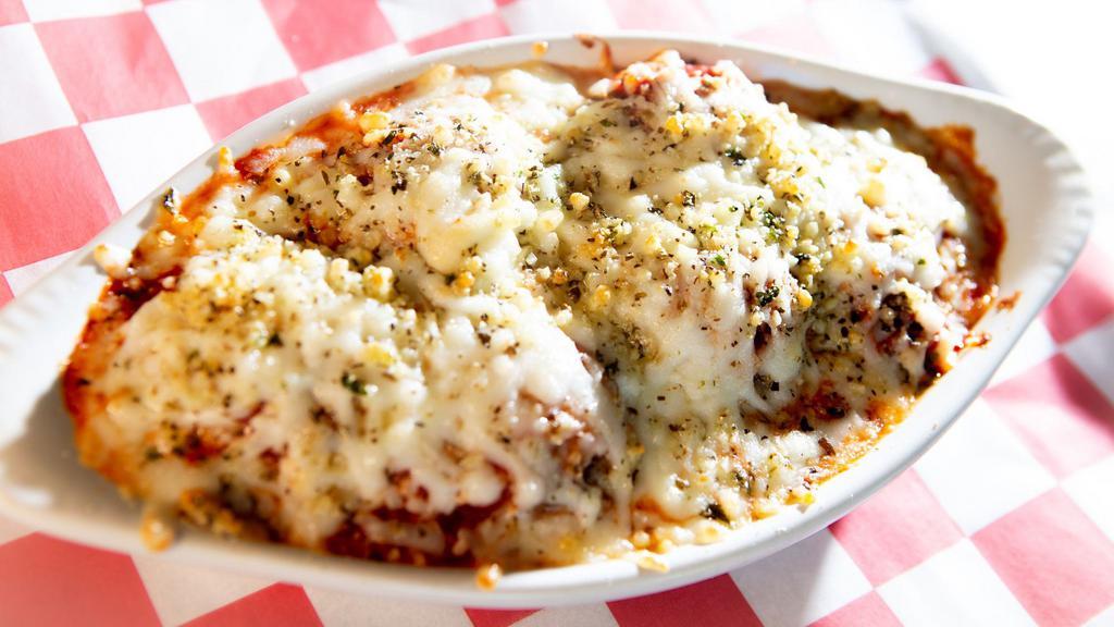 South Street Meatball Bake · Meatballs, homemade marinara and hand-grated mozzarella baked to a prized perfection, topped with Parry’s Parmesan mix.