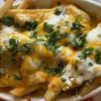 Green Yankee Fries · Straight-cut fries topped with spicy green chili, cheddar cheese and hand-grated mozzarella,...