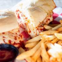 Ad-Rock Chicken Parm · Hand-breaded Parmesan chicken covered with homemade marinara, topped with melted hand-grated...