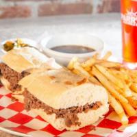 Hot Beef Dip · Fresh, thinly sliced steak served on an Italian roll with pickled giardiniera and au jus dip...