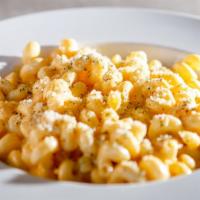 Manhattan Mac & Cheese · A large portion of cavatappi pasta mixed with creamy, melted cheddar cheese – Add bacon for ...