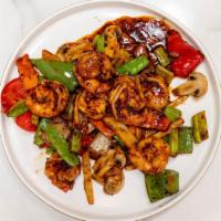 Sf07. Szechuan Shrimp · Spicy. Sautéed with jumbo shrimp, green onion, water chestnut, carrot, zucchini, red chili p...
