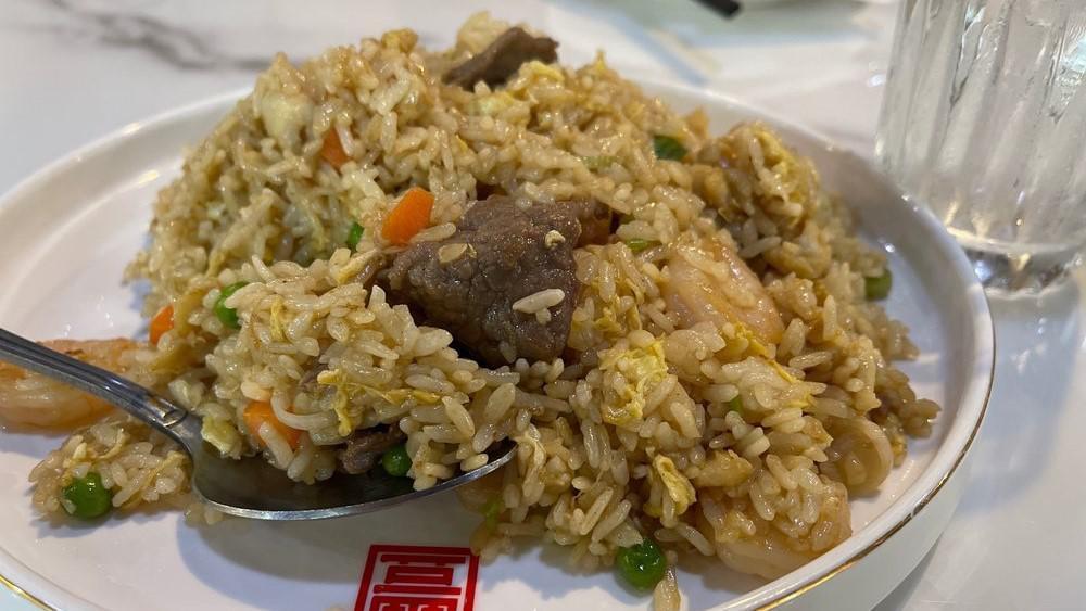 Fr01. Combination Fried Rice · Sautéed with sliced beef, sliced chicken breast, shrimp, egg, pea, carrot, onion, and rice.