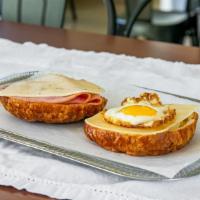 Croissant Melt · Egg, ham, and swiss on croissant.