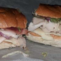 Turkey Club (Full) · Fresh turkey topped with crisp turkey bacon, provolone and swiss cheese, lettuce, tomatoes, ...