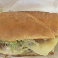 Philly Steak (Half) · Steak strips, green peppers, onions, swiss and provolone cheese, lettuce, tomatoes and mayo.