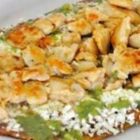 Grilled Chicken Huarache · Served with green, red, or campechano sauce, onions, and queso fresco.